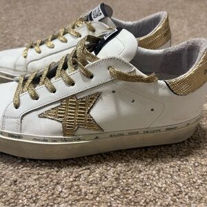 Golden Goose White and Gold Sneakers